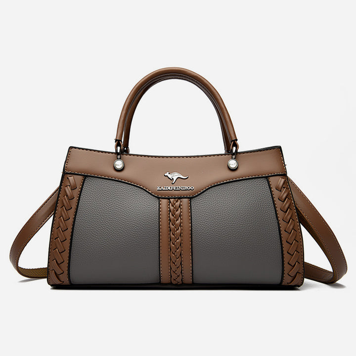 Horizontale Tasche mit Henkel oben und Twist-Streifen, süße Umhängetasche