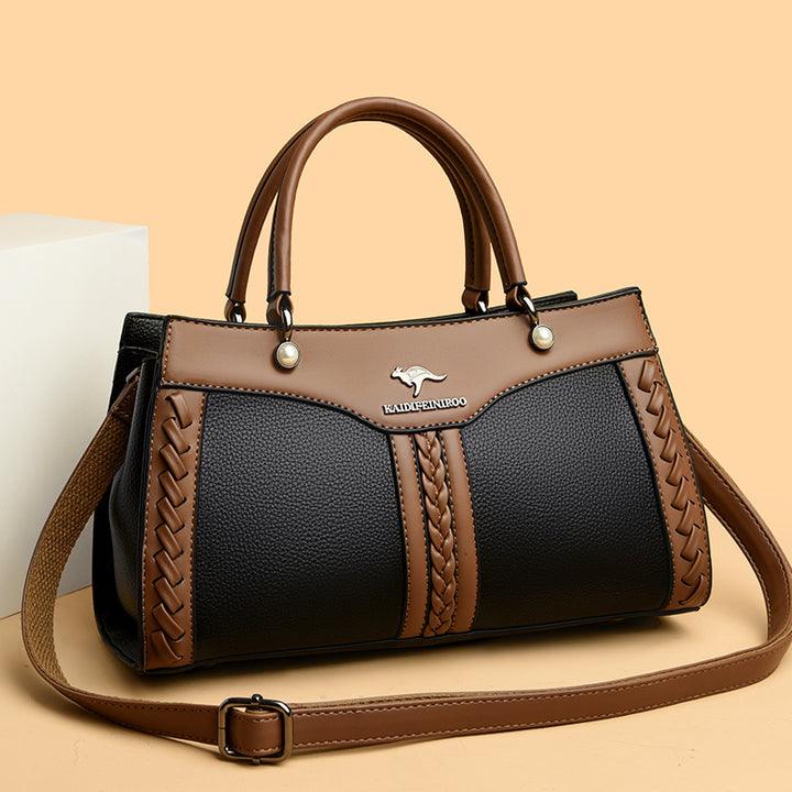 Horizontale Tasche mit Henkel oben und Twist-Streifen, süße Umhängetasche