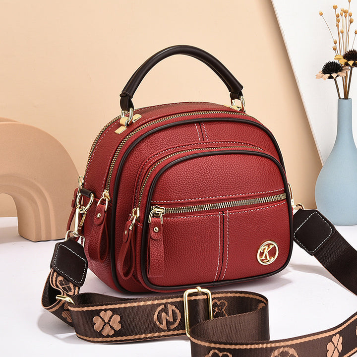 Runde Handtasche mit zwei Fächern für Damen, Dating-Umhängetasche aus Leder