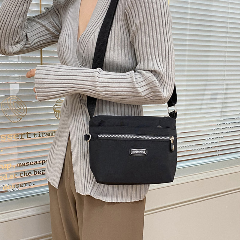 Schlanke Umhängetasche für Damen, minimalistische, wasserdichte Schultertasche aus Nylon
