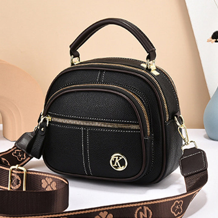 Runde Handtasche mit zwei Fächern für Damen, Dating-Umhängetasche aus Leder