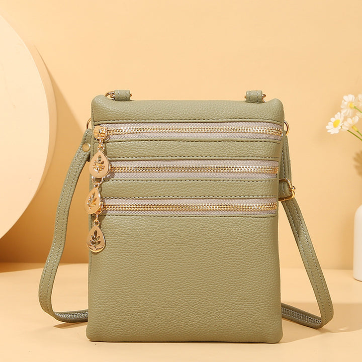 Umhängetasche aus Kunstleder mit drei Fächern, Handytasche