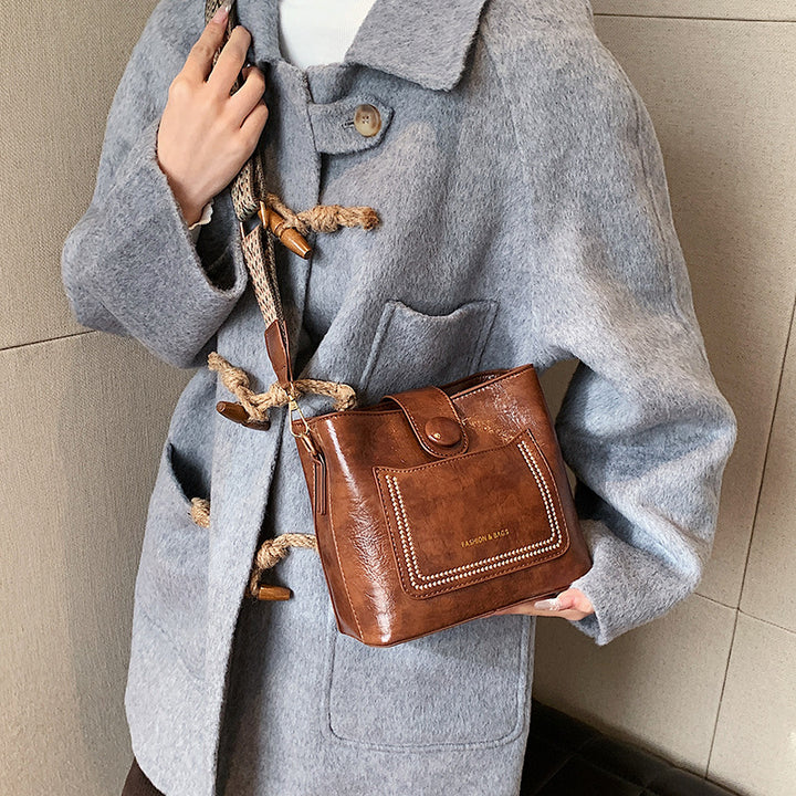 Damen Bucket Bag mit breitem Riemen, einfarbig, elegante Umhängetasche