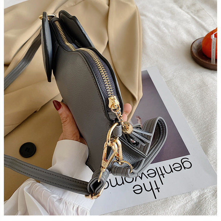Lustige Umhängetasche in eleganter Form, Party-Handgelenktasche für Frauen