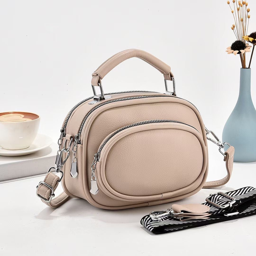 Runde Handtasche mit zwei Fächern für Damen, Dating-Umhängetasche aus Leder