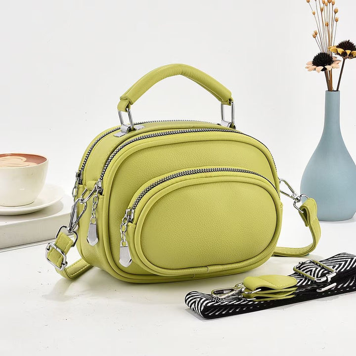 Runde Handtasche mit zwei Fächern für Damen, Dating-Umhängetasche aus Leder