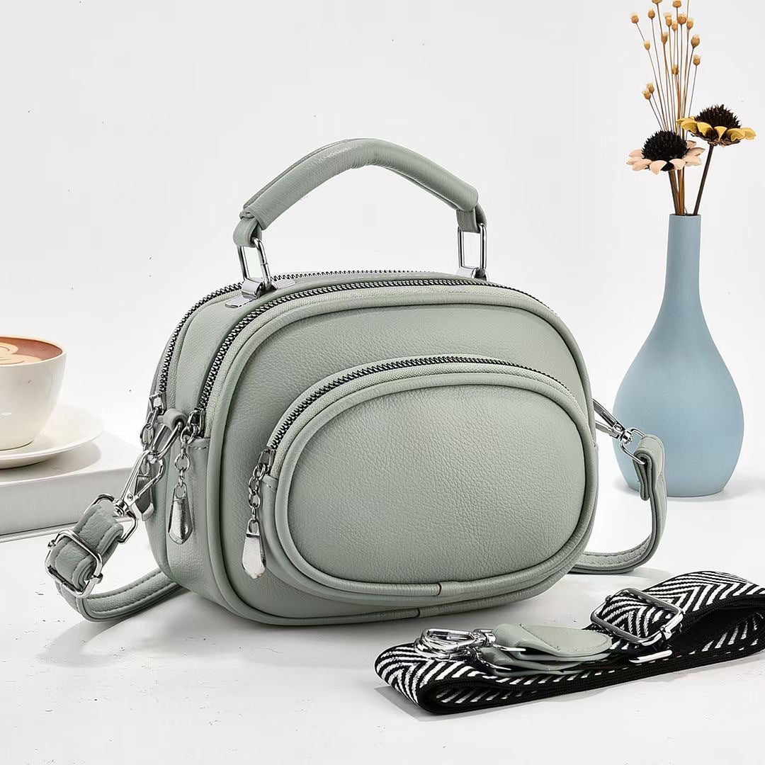 Runde Handtasche mit zwei Fächern für Damen, Dating-Umhängetasche aus Leder