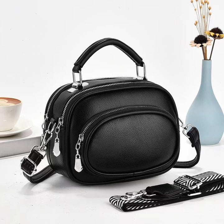 Runde Handtasche mit zwei Fächern für Damen, Dating-Umhängetasche aus Leder