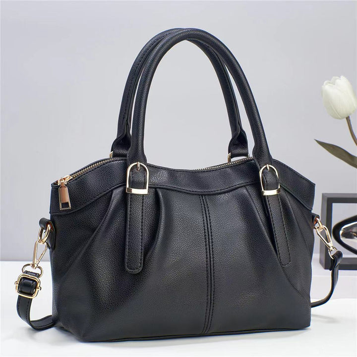 Schlichte Bürotasche für Damen aus Leder mit Henkel