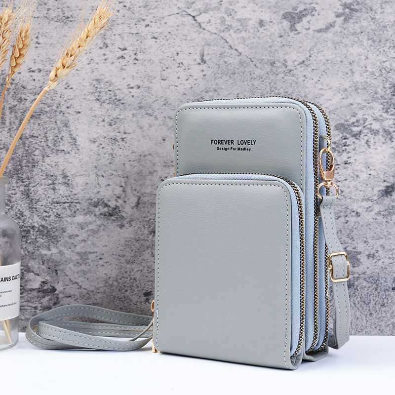 Handytasche mit mehreren Fächern und transparentem Fenster - Hellblau - image 18