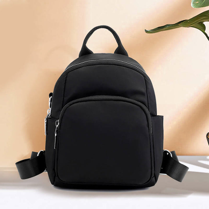 Wasserdichter Casual Mini Rucksack Umwandelbare Schultertasche Tagesrucksack für Frauen