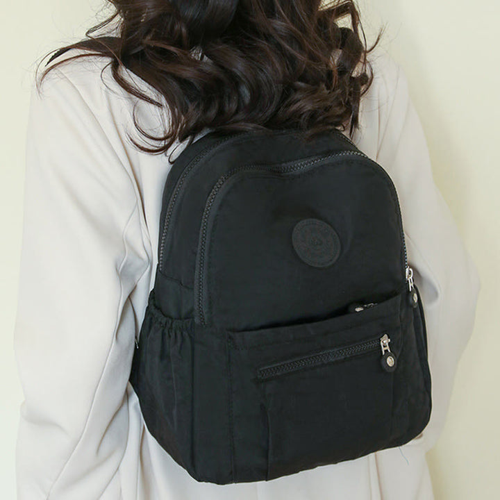 Leichter kleiner Rucksack Multi-Taschen Mini Reise-Tagesrucksack für Frauen