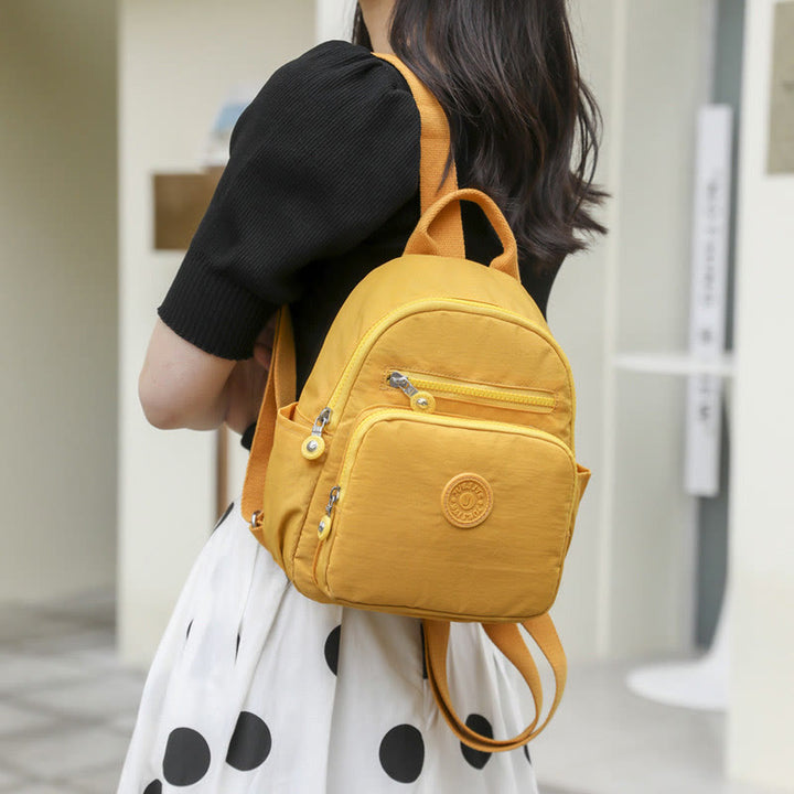 Leichter kompakter Reise-Rucksack für Frauen Funktionaler Mini-Rucksack