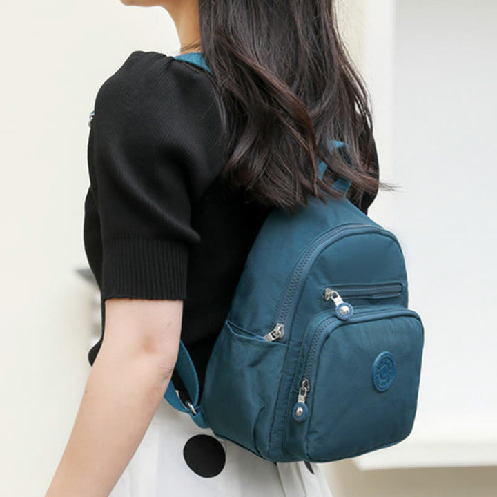 Leichter kompakter Reise-Rucksack für Frauen Funktionaler Mini-Rucksack