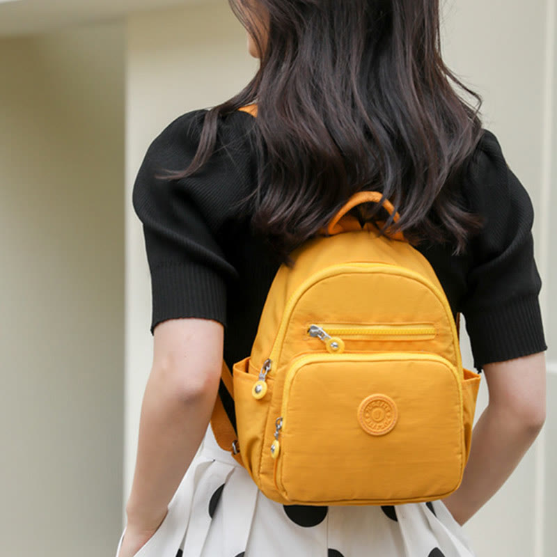 Leichter kompakter Reise-Rucksack für Frauen Funktionaler Mini-Rucksack