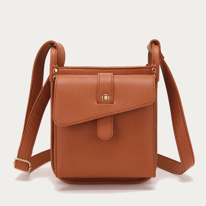 Kleine Umhängetasche aus weichem, gekrispeltem veganen Leder im Vintage-Stil mit mehreren Taschen