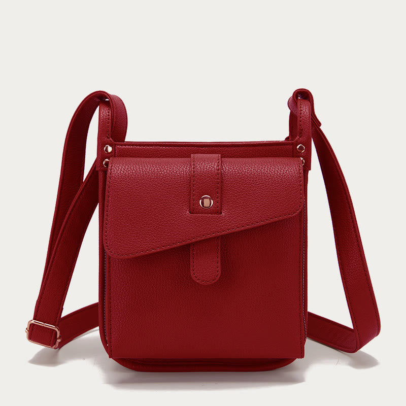 Kleine Umhängetasche aus weichem, gekrispeltem veganen Leder im Vintage-Stil mit mehreren Taschen