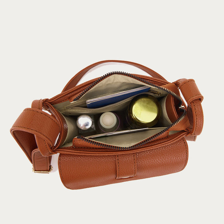 Kleine Umhängetasche aus weichem, gekrispeltem veganen Leder im Vintage-Stil mit mehreren Taschen