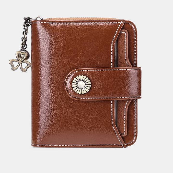 Kompakte, zweifach faltbare Lederbrieftasche mit RFID-Blockierung und abnehmbarem Kartenhalter