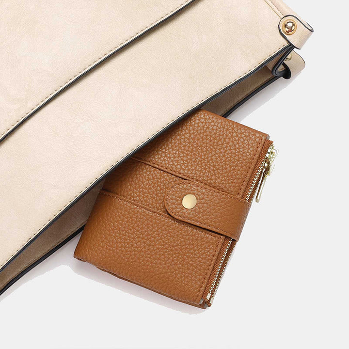 Dreifach faltbare, kompakte Geldbörse für Damen aus echtem Leder mit RFID-Blockierung