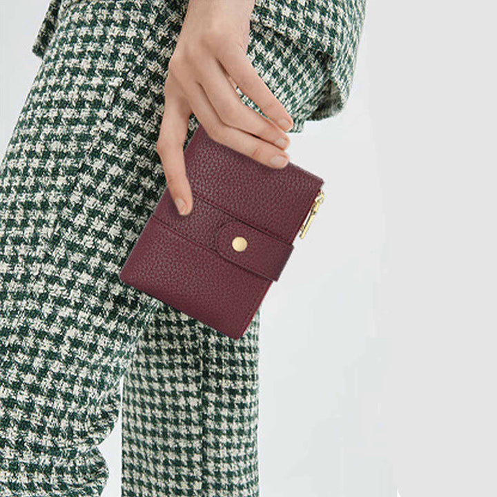 Dreifach faltbare, kompakte Geldbörse für Damen aus echtem Leder mit RFID-Blockierung
