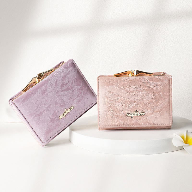 Kleine dreifach faltbare Geldbörse aus weichem Cord für Damen mit Kiss-Lock-Fach