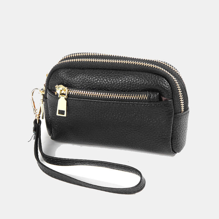 Kleine Geldbörse aus echtem Leder mit mehreren Taschen und Handschlaufe
