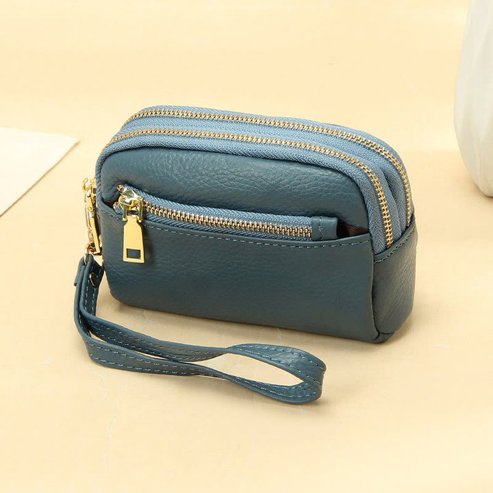 Kleine Geldbörse aus echtem Leder mit mehreren Taschen und Handschlaufe
