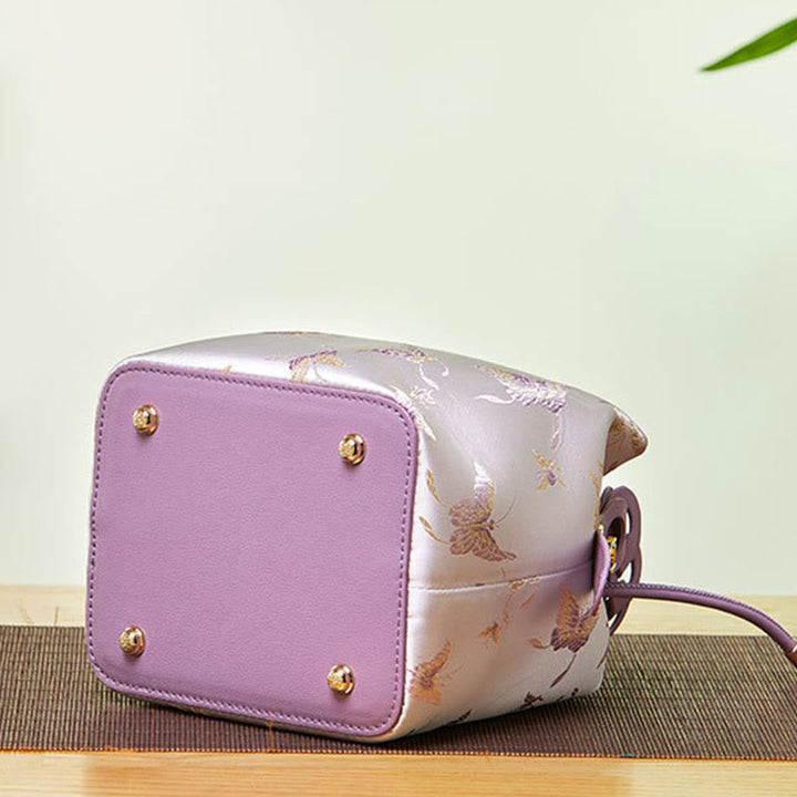 Beuteltasche aus Seide mit Stickerei und Kordelzug, Umhängetasche aus Leder