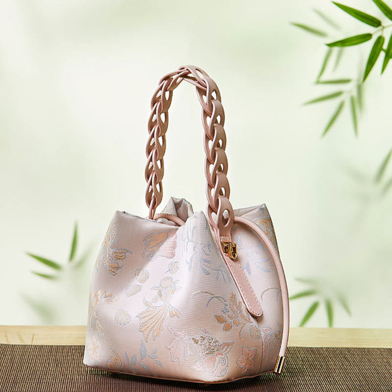Beuteltasche aus Seide mit Stickerei und Kordelzug, Umhängetasche aus Leder