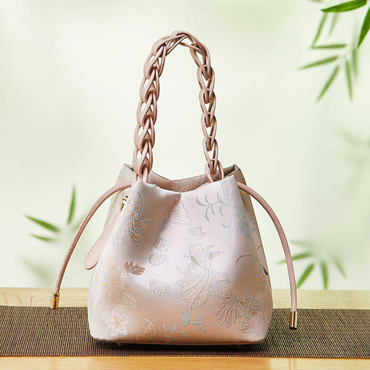 Beuteltasche aus Seide mit Stickerei und Kordelzug, Umhängetasche aus Leder