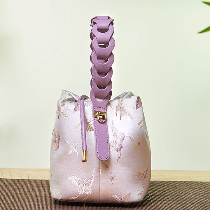 Beuteltasche aus Seide mit Stickerei und Kordelzug, Umhängetasche aus Leder