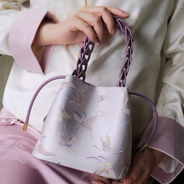 Beuteltasche aus Seide mit Stickerei und Kordelzug, Umhängetasche aus Leder