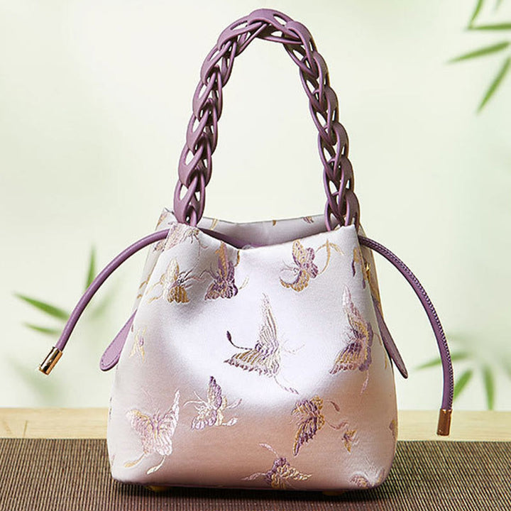 Beuteltasche aus Seide mit Stickerei und Kordelzug, Umhängetasche aus Leder