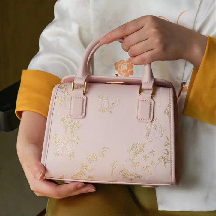 Kleine quadratische Tasche aus echtem Leder mit Stickerei