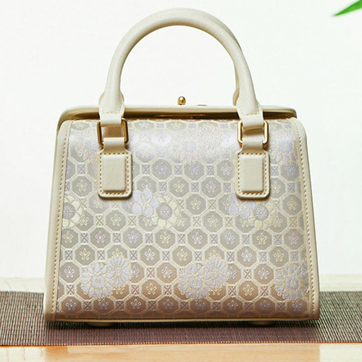 Kleine quadratische Tasche aus echtem Leder mit Stickerei