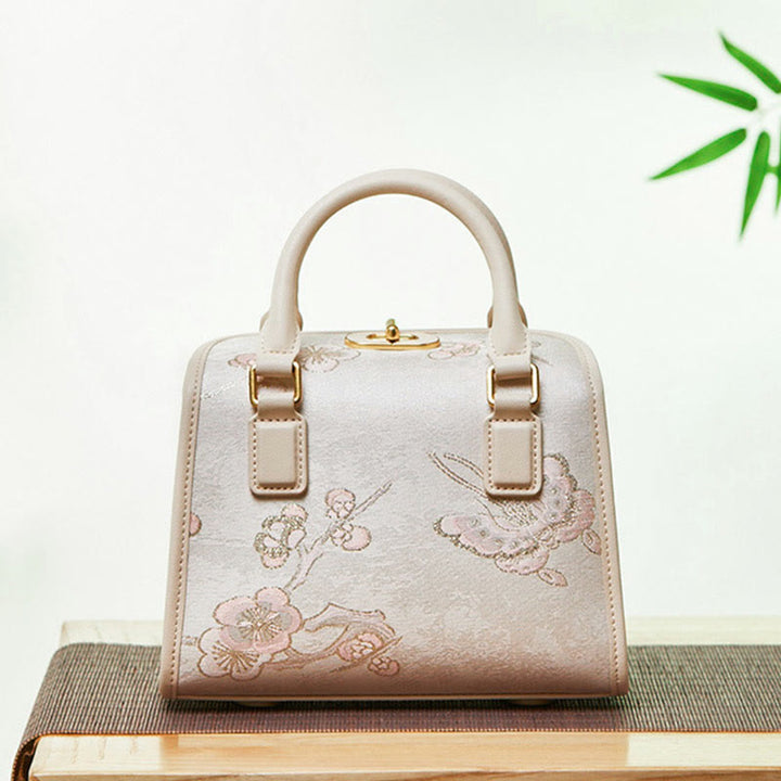Kleine quadratische Tasche aus echtem Leder mit Stickerei