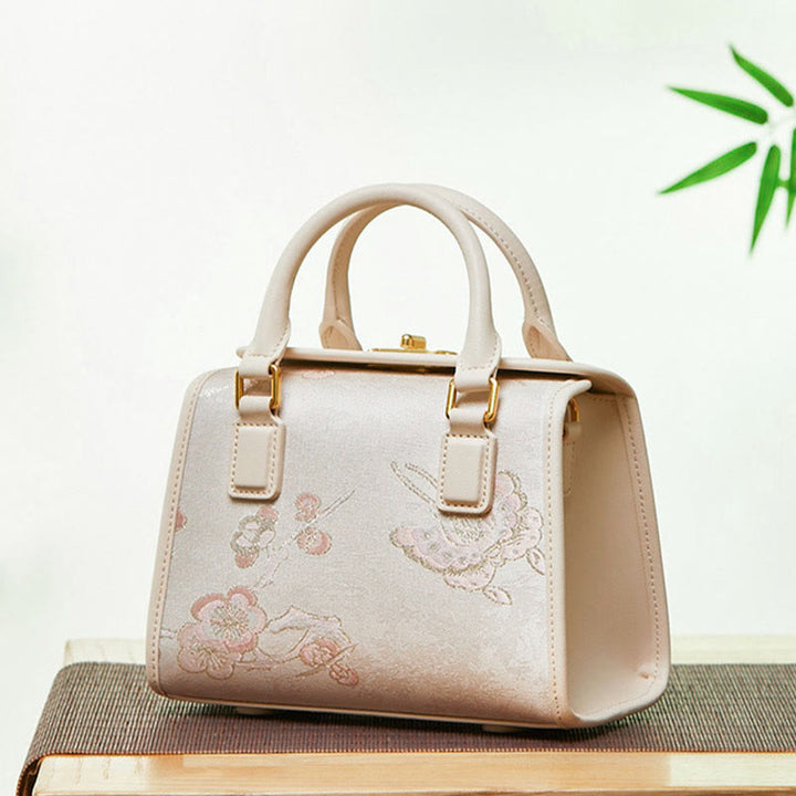 Kleine quadratische Tasche aus echtem Leder mit Stickerei