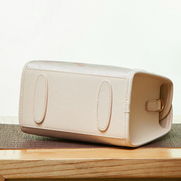 Kleine quadratische Tasche aus echtem Leder mit Stickerei