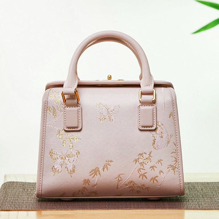 Kleine quadratische Tasche aus echtem Leder mit Stickerei