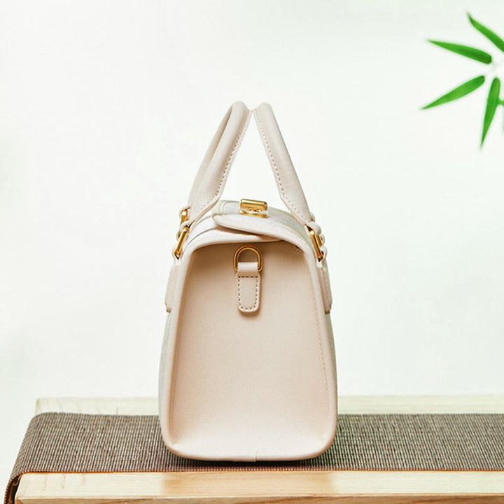 Kleine quadratische Tasche aus echtem Leder mit Stickerei