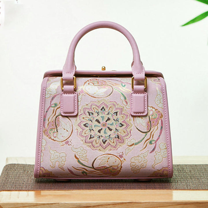 Kleine quadratische Tasche aus echtem Leder mit Stickerei