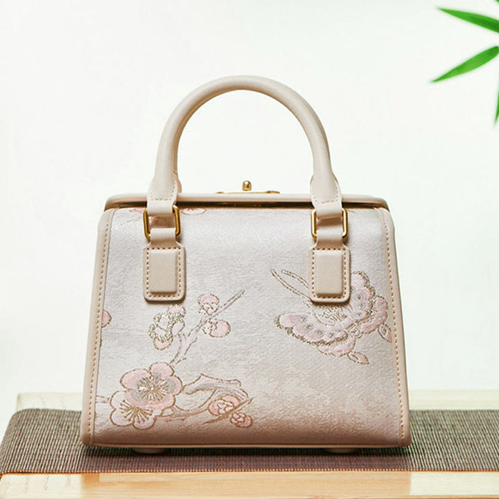 Kleine quadratische Tasche aus echtem Leder mit Stickerei