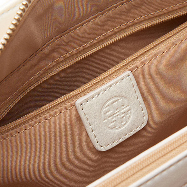 Handtasche aus perlmuttfarbenem, weißem Leder mit Lotusstickerei