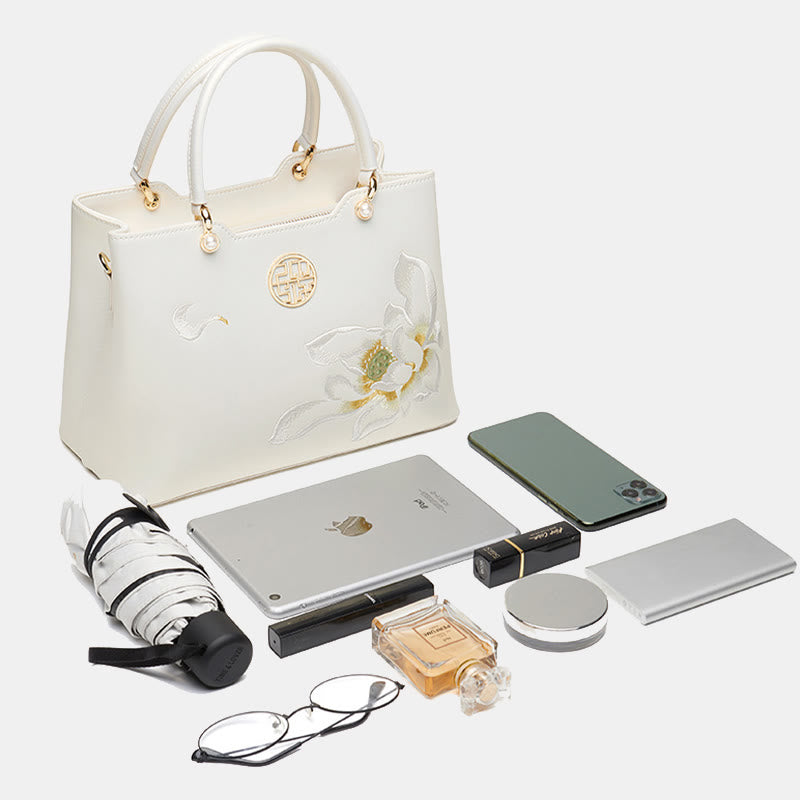 Handtasche aus perlmuttfarbenem, weißem Leder mit Lotusstickerei