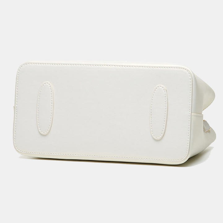 Handtasche aus perlmuttfarbenem, weißem Leder mit Lotusstickerei