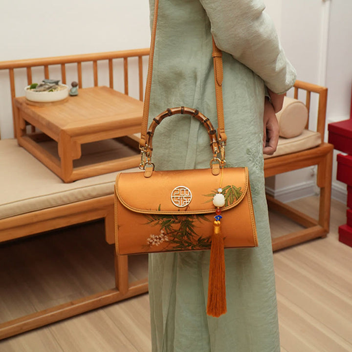 XiangYunSha Abendtasche aus Seide mit Bergmalerei und Bambusgriff