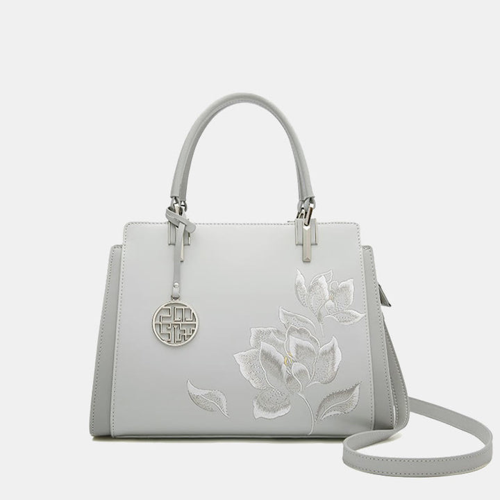 Handtasche aus echtem Leder mit Magnolienblumen-Stickerei
