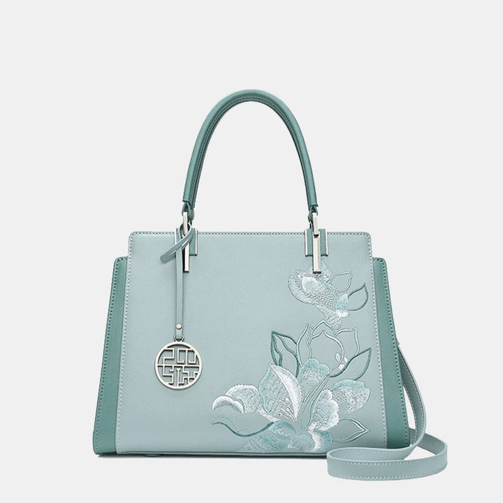 Handtasche aus echtem Leder mit Magnolienblumen-Stickerei