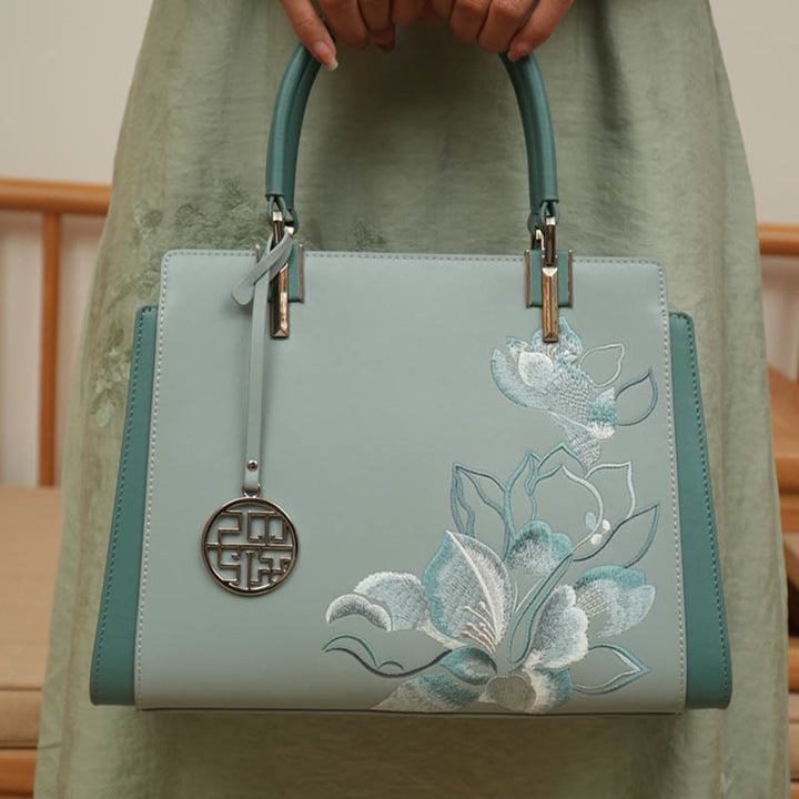 Handtasche aus echtem Leder mit Magnolienblumen-Stickerei
